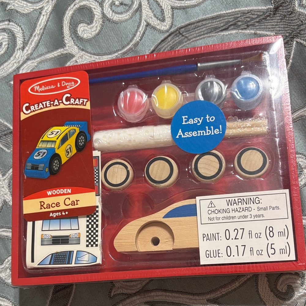 Melissa & Doug Create-A-Craft Wooden Race Car Kit - Blue, Yellow, Red